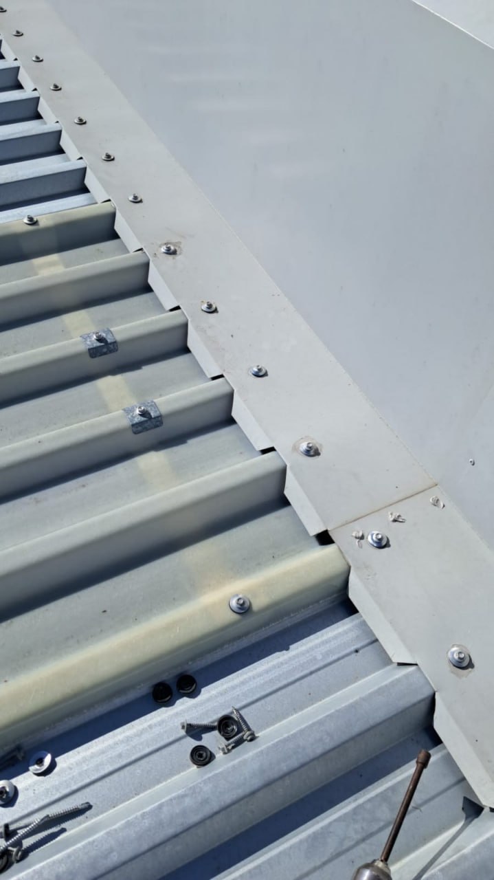 Decramastic roof replacement by Envelope Roofing — roof edge trim work