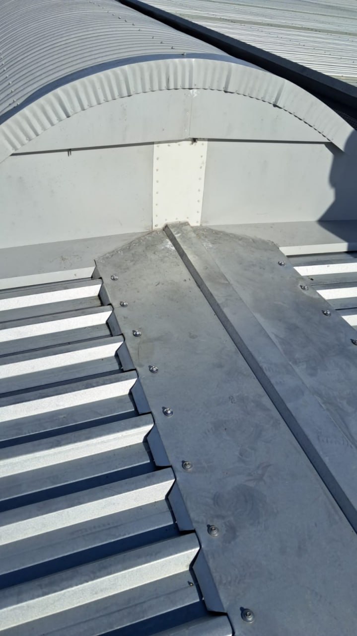 Ridge cap detail on industrial roof