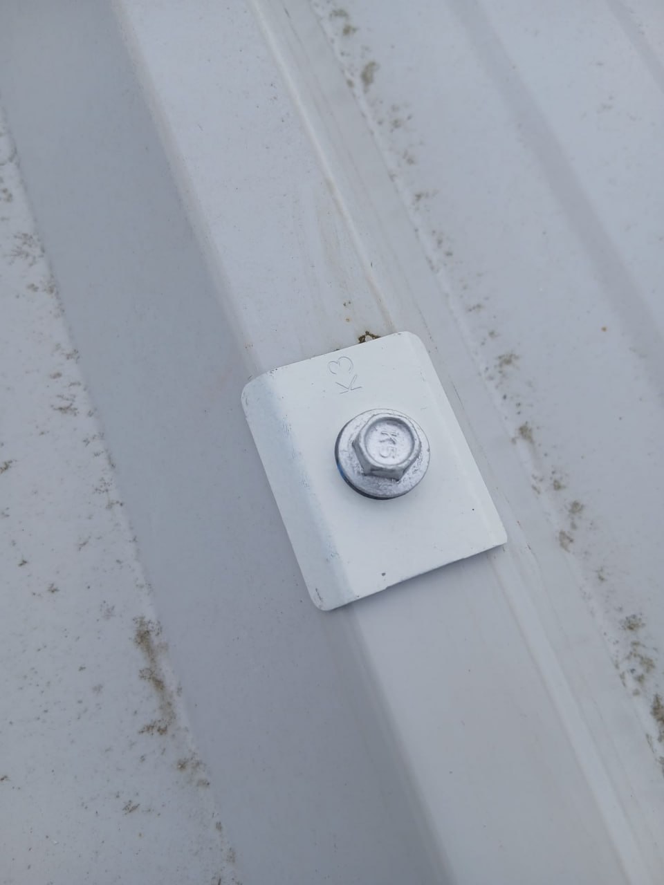 Fastener installation detail on metal roof