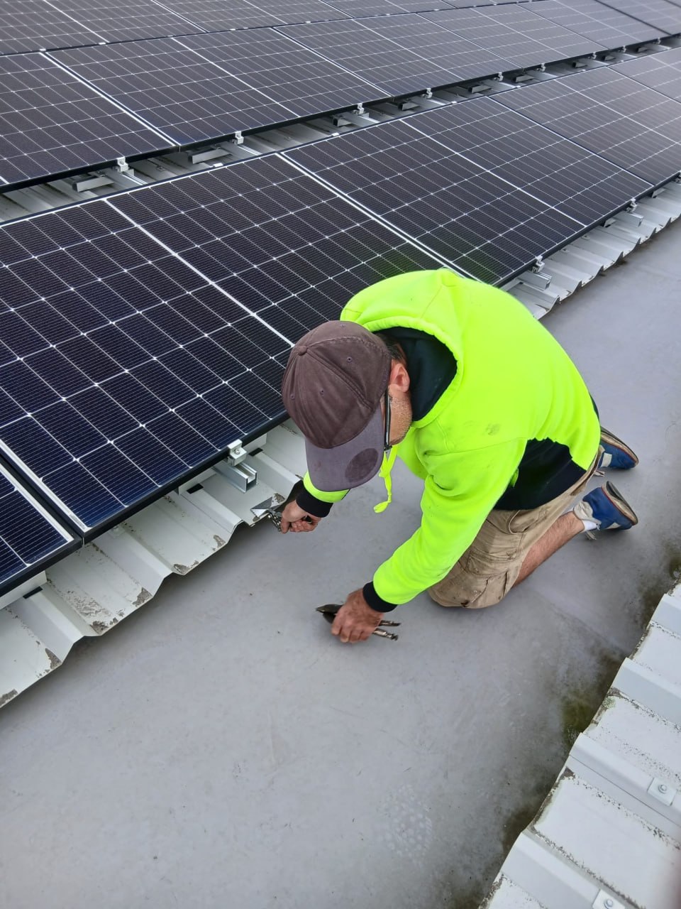 Envelope Roofing technician on roof